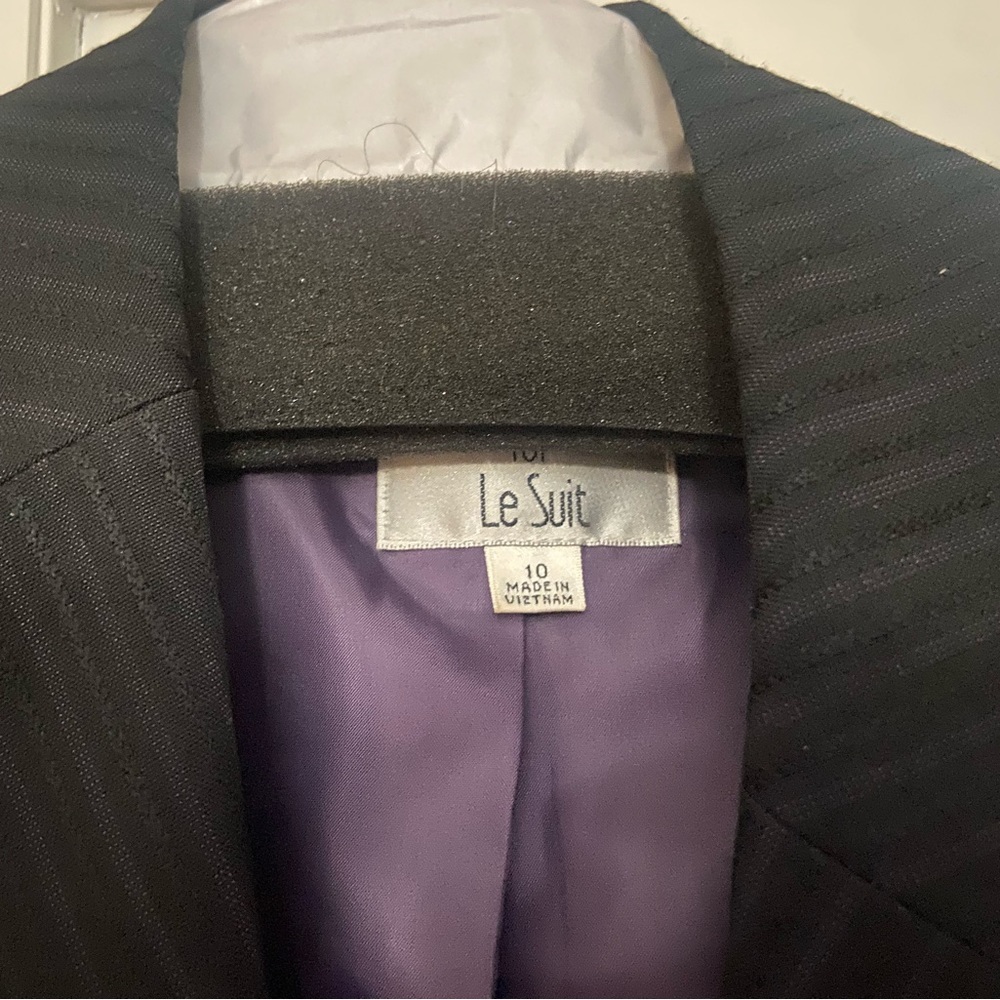 Pant suit, black with purple stripe.